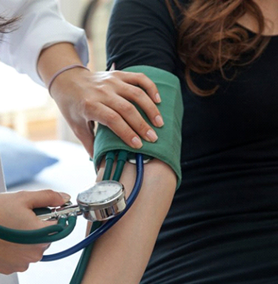 a doctor performing a physical exam on a patient