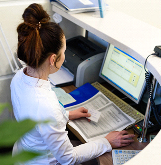 Receptionist at a desk