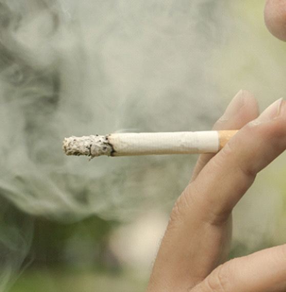 A man smoking a cigarette